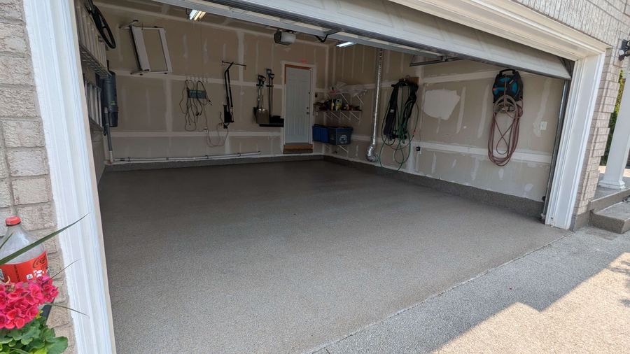 Finished flake epoxy garage floor built to withstand GTA winters and road salt